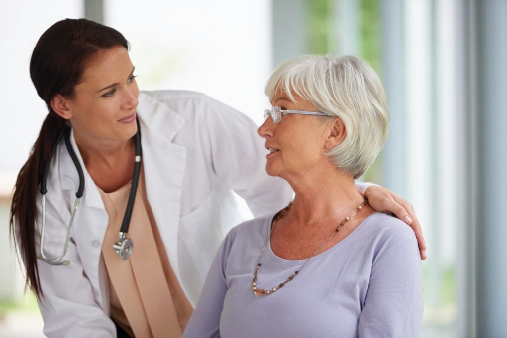 doctors need to be good listeners too shot of young doctor checking up on her senior patient